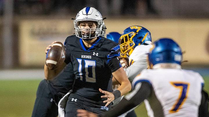 Lakeland Christian and USF commit Brody Brenneman looks to pass against Orlando Christian Prep Ernst Peters/The Ledger