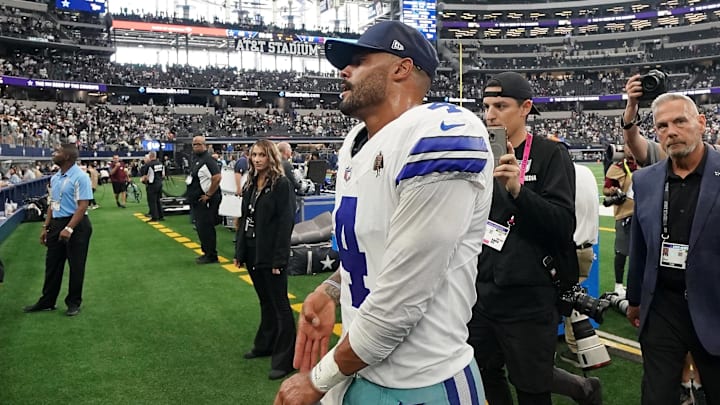 Dallas Cowboys quarterback Dak Prescott walks off the field after the game against the New York Giants at AT&T Stadium.