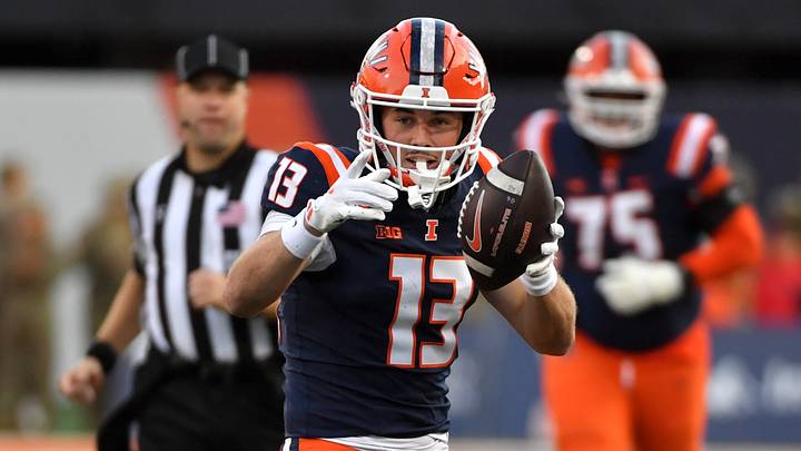Nov 15, 2025; Champaign, Illinois, USA; Illinois Fighting Illini wide receiver Hudson Clement (13) reacts after a catch and run during the first half against the Maryland Terrapins at Memorial Stadium. Mandatory Credit: Ron Johnson-Imagn Images Nov 15, 2025; Champaign, Illinois, USA; Illinois Fighting Illini wide receiver Hudson Clement (13) reacts after a catch and run during the first half against the Maryland Terrapins at Memorial Stadium. Mandatory Credit: Ron Johnson-Imagn Images