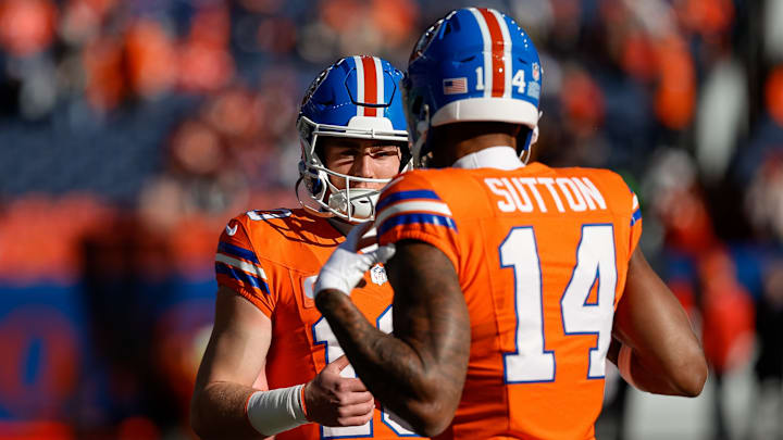 Jan 5, 2025; Denver, Colorado, USA; Denver Broncos quarterback Bo Nix (10) and wide receiver Courtland Sutton (14) before the game against the Kansas City Chiefs at Empower Field at Mile High. 