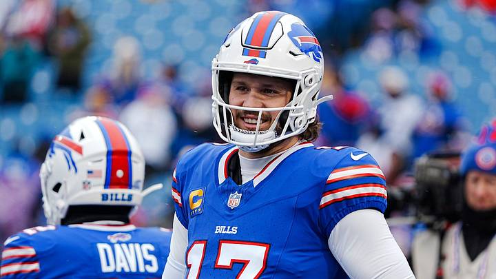 Buffalo Bills quarterback Josh Allen (17) smiles at something someone said before the Buffalo Bills wild card game against the Denver Broncos at Highmark Stadium in Orchard Park on Jan. 12, 2025. Buffalo Bills quarterback Josh Allen (17) smiles at something someone said before the Buffalo Bills wild card game against the Denver Broncos at Highmark Stadium in Orchard Park on Jan. 12, 2025.