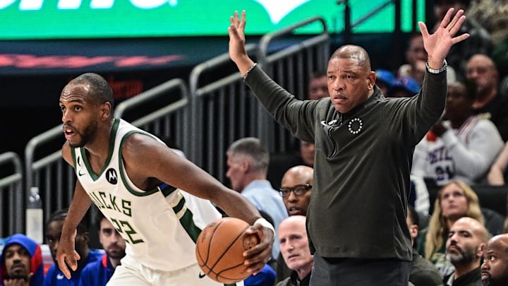 Apr 2, 2023; Milwaukee, Wisconsin, USA; Philadelphia 76ers head coach Doc Rivers calls a play behind Milwaukee Bucks forward Khris Middleton (22) in the third quarter at Fiserv Forum. Mandatory Credit: Benny Sieu-Imagn Images Apr 2, 2023; Milwaukee, Wisconsin, USA; Philadelphia 76ers head coach Doc Rivers calls a play behind Milwaukee Bucks forward Khris Middleton (22) in the third quarter at Fiserv Forum. Mandatory Credit: Benny Sieu-Imagn Images