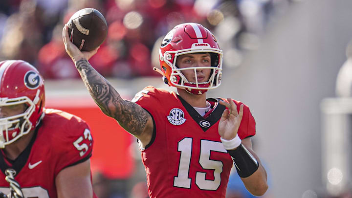 Oct 5, 2024; Athens, Georgia, USA; Georgia Bulldogs quarterback Carson Beck (15) passes against the Auburn Tigers during the first half at Sanford Stadium.