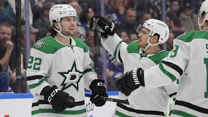 Jan 14, 2025; Toronto, Ontario, CAN; Dallas Stars forward Logan Stankoven (11) goes to congratulates forward Mavrik Bourque (22) on his goal against the Toronto Maple Leafs during the second period at Scotiabank Arena. Mandatory Credit: John E. Sokolowski-Imagn Images