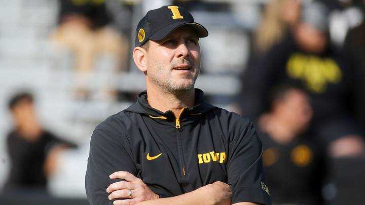 Iowa football’s offensive coordinator Tim Lester watches warmups before the game against Washington Saturday, Oct. 12, 2024 at Kinnick Stadium in Iowa City, Iowa.