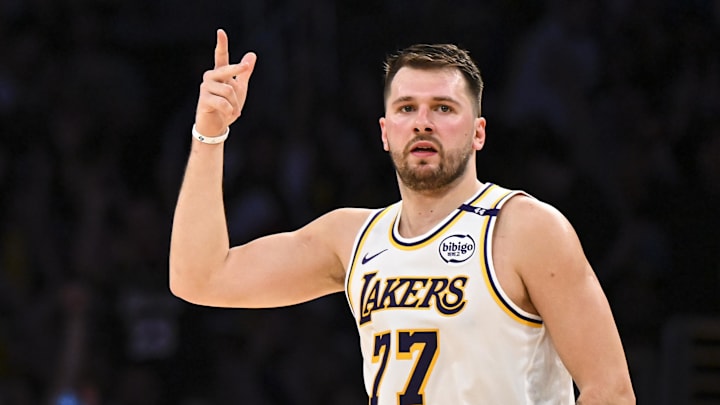 Mar 22, 2025; Los Angeles, California, USA; Los Angeles Lakers guard Luka Doncic (77) reacts after scoring against Chicago Bulls during the first half at Crypto.com Arena. Mandatory Credit: Jonathan Hui-Imagn Images Mar 22, 2025; Los Angeles, California, USA; Los Angeles Lakers guard Luka Doncic (77) reacts after scoring against Chicago Bulls during the first half at Crypto.com Arena. Mandatory Credit: Jonathan Hui-Imagn Images