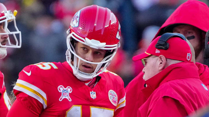 Dec 21, 2024; Kansas City, Missouri, USA; Kansas City Chiefs quarterback Patrick Mahomes (15) talks with head coach Andy Reid during the second half against the Houston Texans at GEHA Field at Arrowhead Stadium. Mandatory Credit: Denny Medley-Imagn Images