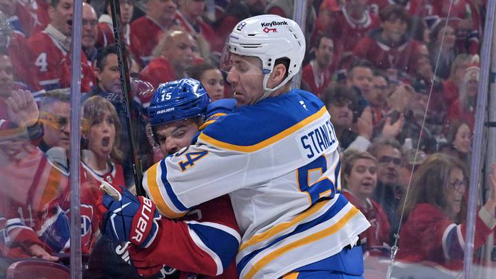 May 10, 2026; Montreal, Quebec, CAN; Buffalo Sabres defenseman Logan Stanley (64) checks Montreal Canadiens forward Alex Newhook (15) during the first period in game three of the second round of the 2026 Stanley Cup Playoffs at the Bell Centre. Mandatory Credit: Eric Bolte-Imagn Images May 10, 2026; Montreal, Quebec, CAN; Buffalo Sabres defenseman Logan Stanley (64) checks Montreal Canadiens forward Alex Newhook (15) during the first period in game three of the second round of the 2026 Stanley Cup Playoffs at the Bell Centre. Mandatory Credit: Eric Bolte-Imagn Images
