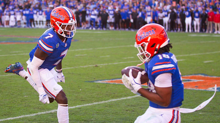 Florida Gators defensive back Bryce Thornton (18) intercepts the ball in the final play of the game during the second half at Ben Hill Griffin Stadium in Gainesville, FL on Saturday, November 23, 2024. The Gators defeated the Rebels 24-17 [Doug Engle/Gainesville Sun]