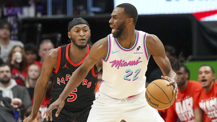 Feb 21, 2025; Toronto, Ontario, CAN; Miami Heat forward Andrew Wiggins (22) moves the ball against Toronto Raptors guard Immanuel Quickley (5) during the second half at Scotiabank Arena. Mandatory Credit: Kevin Sousa-Imagn Images Feb 21, 2025; Toronto, Ontario, CAN; Miami Heat forward Andrew Wiggins (22) moves the ball against Toronto Raptors guard Immanuel Quickley (5) during the second half at Scotiabank Arena. Mandatory Credit: Kevin Sousa-Imagn Images