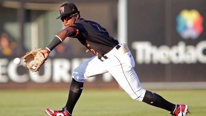 Wisconsin Timber Rattlers' Luis Pena (2) fields a hit against the Quad Cities River Bandits Wednesday, August 27, 2025, at Neuroscience Group Field at Fox Cities Stadium in Grand Chute, Wisconsin. Quad City won 9-5. Wisconsin Timber Rattlers' Luis Pena (2) fields a hit against the Quad Cities River Bandits Wednesday, August 27, 2025, at Neuroscience Group Field at Fox Cities Stadium in Grand Chute, Wisconsin. Quad City won 9-5.