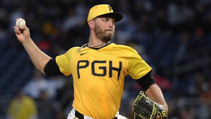 May 23, 2025; Pittsburgh, Pennsylvania, USA;  Pittsburgh Pirates relief pitcher Tanner Rainey (27) pitches against the Milwaukee Brewers during the seventh inning at PNC Park. Mandatory Credit: Charles LeClaire-Imagn Images
