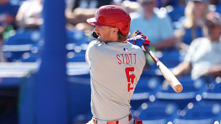 Feb 26, 2025; Dunedin, Florida, USA; Philadelphia Phillies second base Bryson Stott (5) hits an rbi single against the Toronto Blue Jays in the sixth inning during spring training at TD Ballpark. Feb 26, 2025; Dunedin, Florida, USA; Philadelphia Phillies second base Bryson Stott (5) hits an rbi single against the Toronto Blue Jays in the sixth inning during spring training at TD Ballpark.