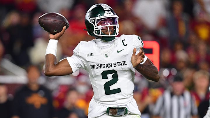 Sep 20, 2025; Los Angeles, California, USA; Michigan State Spartans quarterback Aidan Chiles (2) throws against the Southern California Trojans during the second half at the Los Angeles Memorial Coliseum. Mandatory Credit: Gary A. Vasquez-Imagn Images