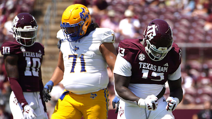 Texas A&M Aggies defensive lineman DJ Hicks (13) reacts during the fourth quarter against the McNeese State Cowboys at Kyle Field.
