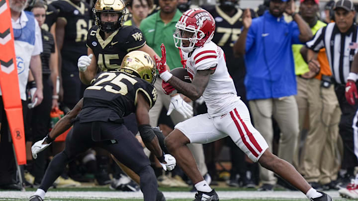 Sep 28, 2024; Winston-Salem, North Carolina, USA; Louisiana-Lafayette Ragin Cajuns wide receiver Harvey Broussard (3) tries to elude Wake Forest Demon Deacons defensive back Jamare Glasker (25) during the first half at Allegacy Federal Credit Union Stadium. Mandatory Credit: Jim Dedmon-Imagn Images Sep 28, 2024; Winston-Salem, North Carolina, USA; Louisiana-Lafayette Ragin Cajuns wide receiver Harvey Broussard (3) tries to elude Wake Forest Demon Deacons defensive back Jamare Glasker (25) during the first half at Allegacy Federal Credit Union Stadium. Mandatory Credit: Jim Dedmon-Imagn Images