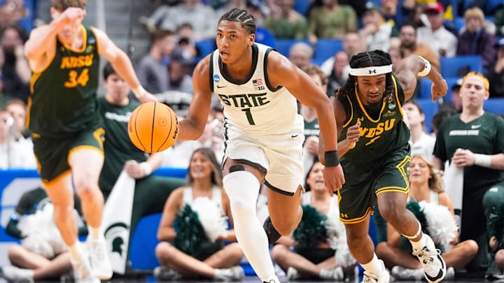 Mar 19, 2026; Buffalo, NY, USA; Michigan State Spartans guard Jeremy Fears Jr. (1) brings the ball up court during the second half against the North Dakota State Bison during a first round game of the men's 2026 NCAA Tournament at Keybank Center. Mandatory Credit: Gregory Fisher-Imagn Images Mar 19, 2026; Buffalo, NY, USA; Michigan State Spartans guard Jeremy Fears Jr. (1) brings the ball up court during the second half against the North Dakota State Bison during a first round game of the men's 2026 NCAA Tournament at Keybank Center. Mandatory Credit: Gregory Fisher-Imagn Images