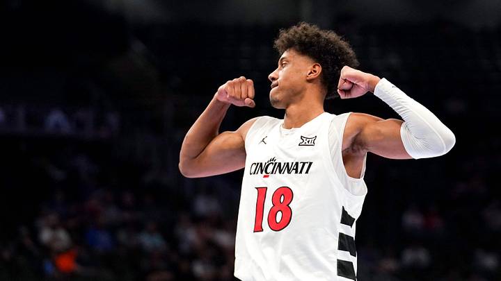 Cincinnati Bearcats forward Baba Miller (18) celebrates after completing a layup after being fouled in the first half of the Phillips 66 Big 12 Men’s Basketball Tournament between the Cincinnati Bearcats and Utah Utes, Tuesday, March 10, 2026, at T-Mobile Center in Kansas City, MO.