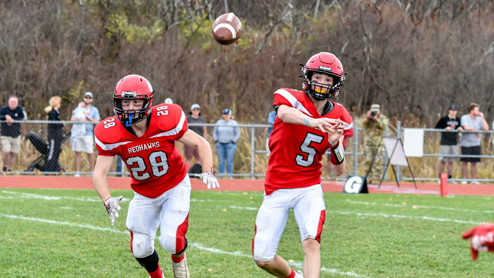 CVU's quarterback. Ollie Cheer throws a pass out to the sideline during the Redhawks' D1 football semifinal vs the Essex Hornets on Saturday afternoon in Hinesburg

D1 Football Semifinal Essex At Cvu 05nov22 9013