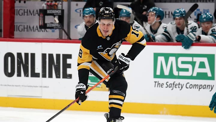 Nov 16, 2024; Pittsburgh, Pennsylvania, USA;  Pittsburgh Penguins right wing Jesse Puljujarvi (18) moves the puck against the San Jose Sharks during the first period at PPG Paints Arena. Mandatory Credit: Charles LeClaire-Imagn Images