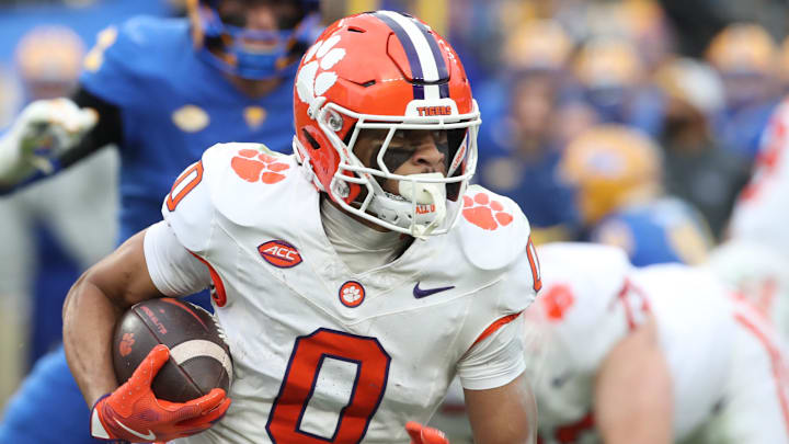Nov 16, 2024; Pittsburgh, Pennsylvania, USA; Clemson Tigers wide receiver Antonio Williams (0) runs the ball against the Pittsburgh Panthers during the fourth quarter at Acrisure Stadium. 