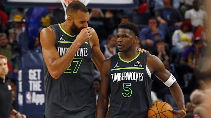 Apr 10, 2025; Memphis, Tennessee, USA; Minnesota Timberwolves center Rudy Gobert (27) talks with guard Anthony Edwards (5) during a time out during the fourth quarter against the Memphis Grizzlies at FedExForum. Apr 10, 2025; Memphis, Tennessee, USA; Minnesota Timberwolves center Rudy Gobert (27) talks with guard Anthony Edwards (5) during a time out during the fourth quarter against the Memphis Grizzlies at FedExForum.