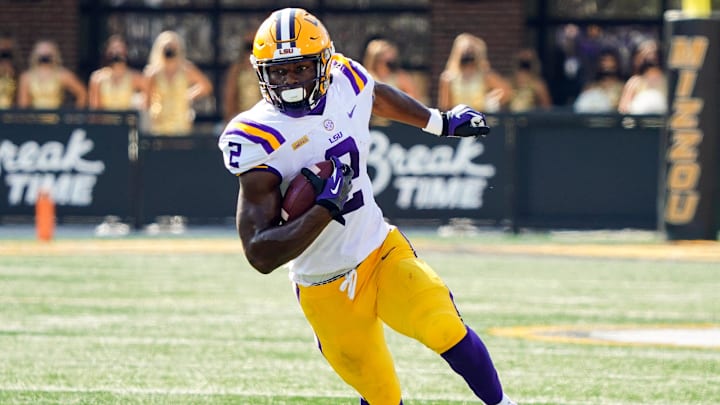 Oct 10, 2020; Columbia, Missouri, USA; LSU Tigers tight end Arik Gilbert (2) runs against the Missouri Tigers during the first half at Faurot Field at Memorial Stadium. Mandatory Credit: Jay Biggerstaff-Imagn Images Oct 10, 2020; Columbia, Missouri, USA; LSU Tigers tight end Arik Gilbert (2) runs against the Missouri Tigers during the first half at Faurot Field at Memorial Stadium. Mandatory Credit: Jay Biggerstaff-Imagn Images