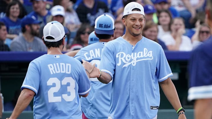 Jun 2, 2023; Kansas City, Missouri, USA; Kansas City Chiefs quarterback Patrick Mahomes celebrates with actor Paul Rudd during the annual Big Slick celebrity softball game prior to a game between the Kansas City Royals and Colorado Rockies at Kauffman Stadium. Mandatory Credit: Denny Medley-Imagn Images