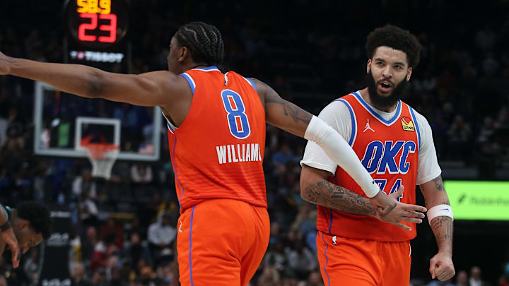 Jan 9, 2026; Memphis, Tennessee, USA; Oklahoma City Thunder guard Jalen Williams (8) and guard Kenrich Williams (34) react during the fourth quarter against the Memphis Grizzlies at FedExForum. Mandatory Credit: Petre Thomas-Imagn Images