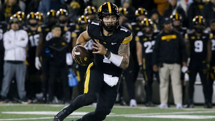 Iowa quarterback Brendan Sullivan (1) scrambles against Wisconsin Saturday, Nov. 2, 2024 at Kinnick Stadium in Iowa City, Iowa.