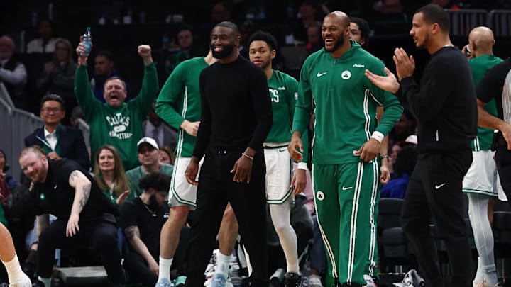 Jan 30, 2026; Boston, Massachusetts, USA; Boston Celtics guard Jaylen Brown (7) (in street clothes) smiles after a Celtic basket during the second quarter against the Sacramento Kings at TD Garden. Mandatory Credit: Winslow Townson-Imagn Images