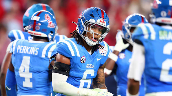 Jan 8, 2026; Glendale, AZ, USA; Mississippi Rebels linebacker TJ Dottery (6) against the Miami Hurricanes during the 2026 Fiesta Bowl and semifinal game of the College Football Playoff at State Farm Stadium. Mandatory Credit: Mark J. Rebilas-Imagn Images Jan 8, 2026; Glendale, AZ, USA; Mississippi Rebels linebacker TJ Dottery (6) against the Miami Hurricanes during the 2026 Fiesta Bowl and semifinal game of the College Football Playoff at State Farm Stadium. Mandatory Credit: Mark J. Rebilas-Imagn Images