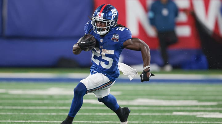 Aug 8, 2024; East Rutherford, New Jersey, USA; New York Giants running back Dante Miller (25) carries the ball during the second half against the Detroit Lions at MetLife Stadium. Mandatory Credit: Vincent Carchietta-USA TODAY Sports