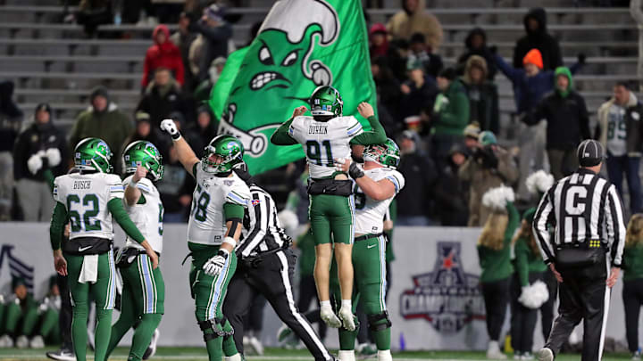 Dec 6, 2024; West Point, NY, USA; Tulane Green Wave kicker Patrick Durkin (91) celebrates his extra point against the Army Black Knights during the first half at Michie Stadium.