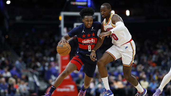 Nov 4, 2024; Washington, District of Columbia, USA; Washington Wizards guard Bub Carrington (8) drives to the basket as Golden State Warriors forward Jonathan Kuminga (00) defends in the first half at Capital One Arena. Mandatory Credit: Geoff Burke-Imagn Images Nov 4, 2024; Washington, District of Columbia, USA; Washington Wizards guard Bub Carrington (8) drives to the basket as Golden State Warriors forward Jonathan Kuminga (00) defends in the first half at Capital One Arena. Mandatory Credit: Geoff Burke-Imagn Images