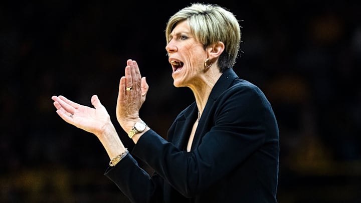 Iowa head coach Jan Jensen reacts during a basketball game against the Illinois Fighting Illini Feb. 26, 2026 at Carver-Hawkeye Arena in Iowa City, Iowa.