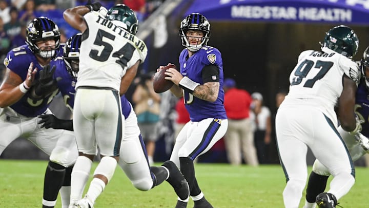 Baltimore Ravens quarterback Devin Leary drops back to pass during a preseason game against the Philadelphia Eagles.