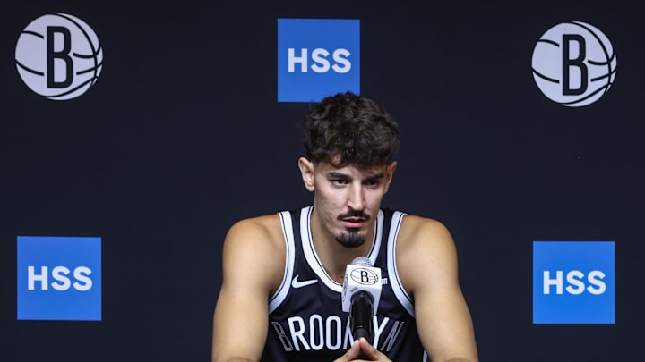 Sep 23, 2025; Brooklyn, NY, USA; Brooklyn Nets guard Ben Saraf (77) speaks at Media Day. Mandatory Credit: Wendell Cruz-Imagn Images Sep 23, 2025; Brooklyn, NY, USA; Brooklyn Nets guard Ben Saraf (77) speaks at Media Day. Mandatory Credit: Wendell Cruz-Imagn Images
