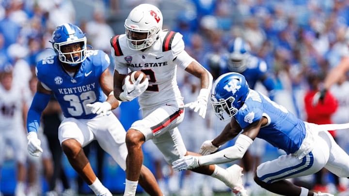 Sep 2, 2023; Lexington, Kentucky, USA; Ball State Cardinals wide receiver Ty Robinson (2) runs the ball during the third quarter against the Kentucky Wildcats at Kroger Field. Mandatory Credit: Jordan Prather-Imagn Images