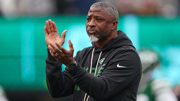 New York Jets head coach Aaron Glenn on the field before the game against the New England Patriots at MetLife Stadium. New York Jets head coach Aaron Glenn on the field before the game against the New England Patriots at MetLife Stadium.