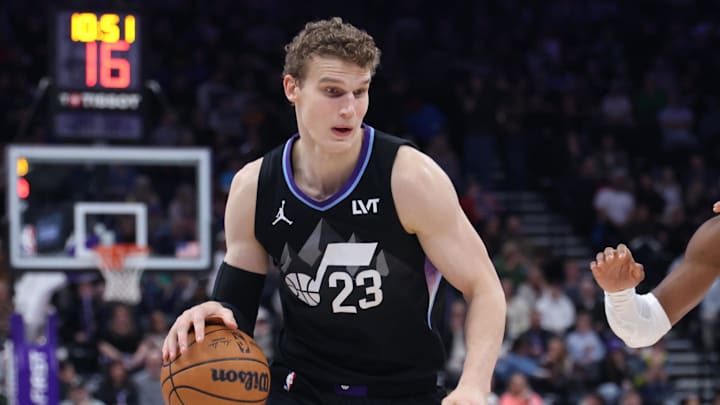 Feb 21, 2025; Salt Lake City, Utah, USA; Utah Jazz forward Lauri Markkanen dribbles the ball against the Oklahoma City Thunder during the third quarter at Delta Center. Mandatory Credit: Rob Gray-Imagn Images