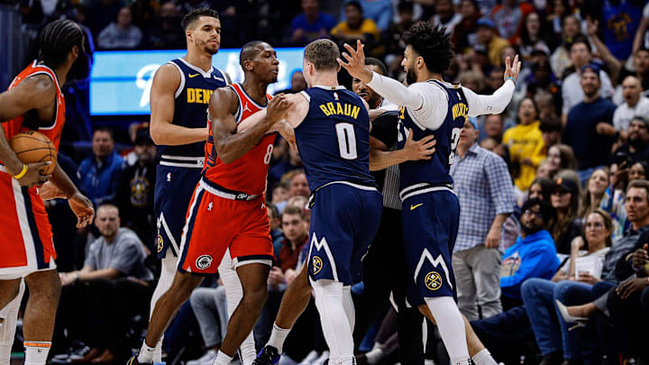 Apr 21, 2025; Denver, Colorado, USA; Denver Nuggets guard Jamal Murray (27) reacts after a play with Los Angeles Clippers guard Norman Powell (24) as guard Kris Dunn (8) and guard Christian Braun (0) push each other as forward Michael Porter Jr. (1) looks on in the third quarter during game two of first round for the 2025 NBA Playoffs at Ball Arena. Mandatory Credit: Isaiah J. Downing-Imagn Images Apr 21, 2025; Denver, Colorado, USA; Denver Nuggets guard Jamal Murray (27) reacts after a play with Los Angeles Clippers guard Norman Powell (24) as guard Kris Dunn (8) and guard Christian Braun (0) push each other as forward Michael Porter Jr. (1) looks on in the third quarter during game two of first round for the 2025 NBA Playoffs at Ball Arena. Mandatory Credit: Isaiah J. Downing-Imagn Images