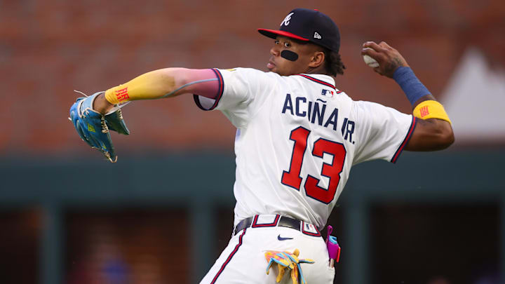 Jun 17, 2025; Atlanta, Georgia, USA; Atlanta Braves right fielder Ronald Acuna Jr. (13) throws the ball against the New York Mets in the second inning at Truist Park. Mandatory Credit: Brett Davis-Imagn Images
