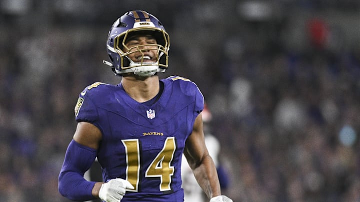 Nov 7, 2024; Baltimore, Maryland, USA; Baltimore Ravens safety Kyle Hamilton (14) reacts after tips a Cincinnati Bengals quarterback Joe Burrow (9) pass during the first quarter  at M&T Bank Stadium. Mandatory Credit: Tommy Gilligan-Imagn Images