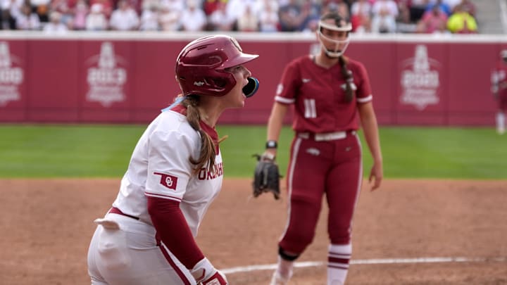 Oklahoma catcher Kendall Wells celebrates a walk against Arkansas at Love's Field.