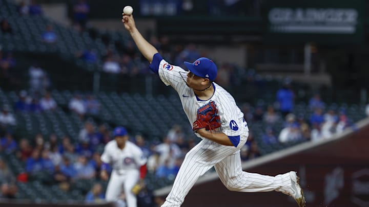 Sep 19, 2024; Chicago, Illinois, USA; Chicago Cubs starting pitcher Javier Assad (72) delivers a pitch against the Washington Nationals during the first inning at Wrigley Field. 