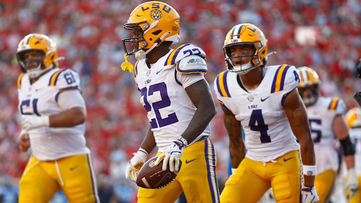 Sep 27, 2025; Oxford, Mississippi, USA; LSU Tigers running back Harlem Berry (22) reacts after a touchdown during the fourth quarter against the Mississippi Rebels at Vaught-Hemingway Stadium. Mandatory Credit: Petre Thomas-Imagn Images Sep 27, 2025; Oxford, Mississippi, USA; LSU Tigers running back Harlem Berry (22) reacts after a touchdown during the fourth quarter against the Mississippi Rebels at Vaught-Hemingway Stadium. Mandatory Credit: Petre Thomas-Imagn Images
