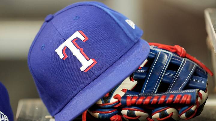 Texas Rangers hat and glove. Credit: John E. Sokolowski-USA TODAY Sports Texas Rangers hat and glove. Credit: John E. Sokolowski-USA TODAY Sports