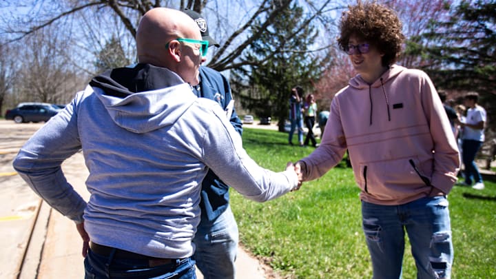 Tim Dwight, a former Iowa and NFL star, will return to Iowa City High as an assistant football coach this fall.