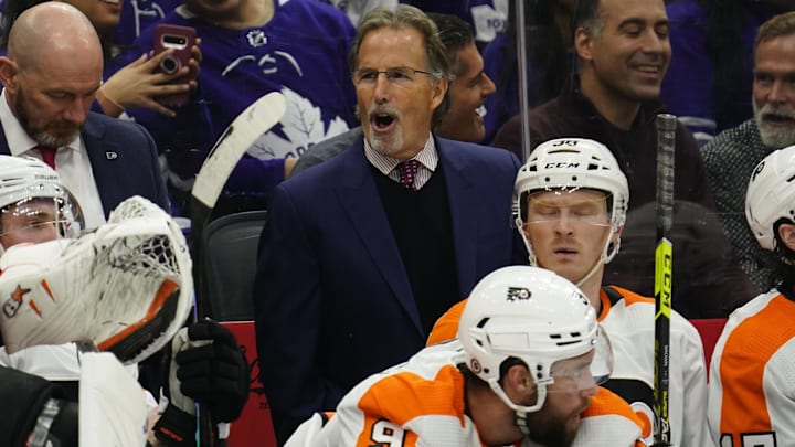 Dec 22, 2022; Toronto, Ontario, CAN; Philadelphia Flyers head coach John Tortorella talks to his players. 